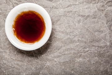black tea cup paper background 