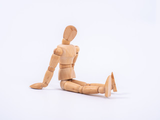 The wooden dummy sits on white background