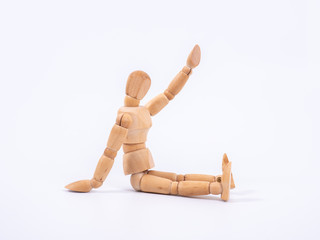 The wooden dummy sits on white background