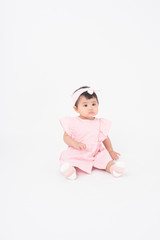 Adorable Asian baby girl is portrait on white background