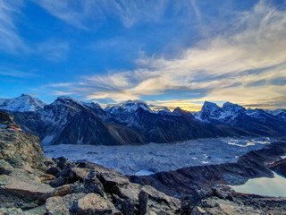 Picturesque view on mountains and Ngozumpa glacier from Gokyo Ri at sunrise. Trekking in Solokhumbu, Nepal, Himalayas.