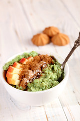 Breakfast of cereal with fruit.