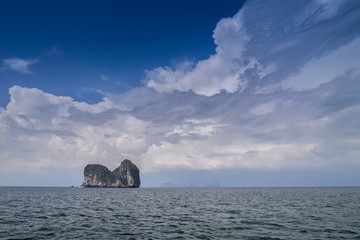 view of Ko Mar (horse island) in the sea with cloudy sky background, Trang sea, southern of...