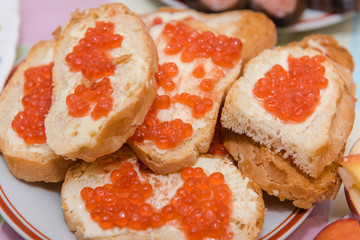 caviar with butter background. red caviar with butter close-up.