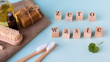 zero waste concept. Wooden cubes with the inscription zero waste on a blue and yellow background 