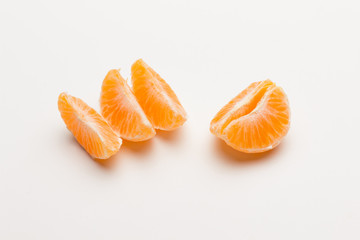 Tangerine orange-skinned sweet fruit of the citrus family.