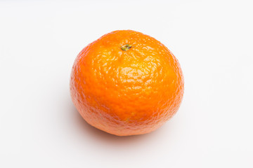 Tangerine orange-skinned sweet fruit of the citrus family.