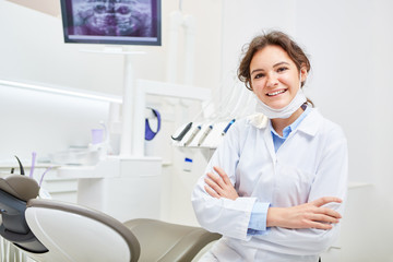 Friendly dental assistant or dentist