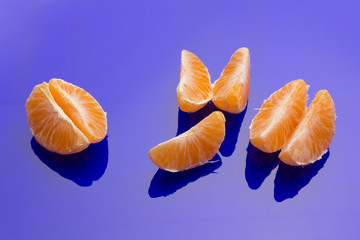 Tangerine orange-skinned sweet fruit of the citrus family.