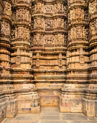 Close up of artful carved walls of Kandariya Mahadeva Temple, Khajuraho Group of Monuments, India