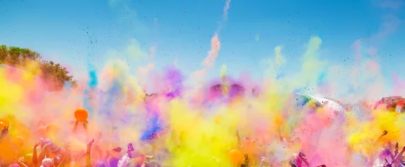 Rolgordijnen Crowd throwing bright colored powder paint in the air at Holi Festival Dahan © Sunshine Seeds
