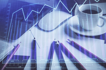 Stock market graph and table with computer background. Multi exposure. Concept of financial analysis.