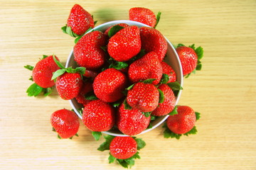 Exotic fruits. Chinese strawberries. Fresh fruits. The berries are red. China. Of Asia. Dessert.
