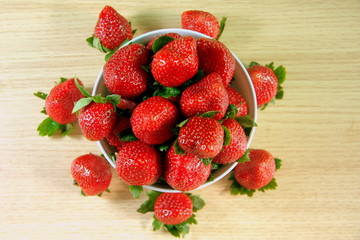 Exotic fruits. Chinese strawberries. Fresh fruits. The berries are red. China. Of Asia. Dessert.