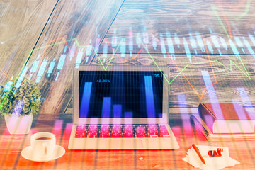 Multi exposure of chart and financial info and work space with computer background. Concept of international online trading.