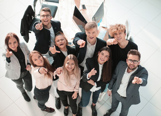 top view. smiling young business team looking at the camera