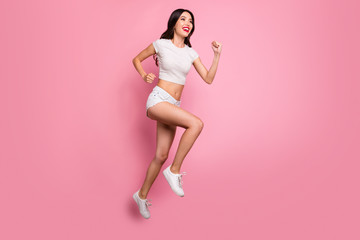 Fototapeta na wymiar Full length body size view of her she nice attractive lovely charming winsome glamorous cheerful cheery wavy-haired girl jumping running fast motion isolated over pink pastel color background