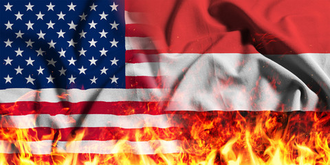 National flag of the United States with Yemen on a waving cotton with a fire texture 