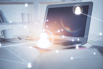 Computer on desktop with social network theme icon. Multi exposure. Concept of international...