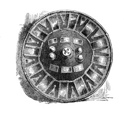 Ethiopian shields made from a very thick, tough leather stretched and hammered over wood forms, dried and then applied and decorated