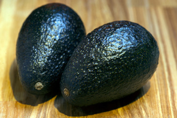 sale of exotic fruits green avocado, still life in the market