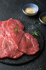 Fresh, thin beef steak with spices
