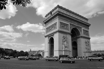 Fototapeta na wymiar Vintage black and white shot of the famous monument Arc de Triomphe in Paris