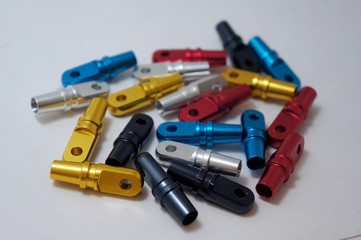 Aluminium metal cnc parts color  Anodized  isolated on white    