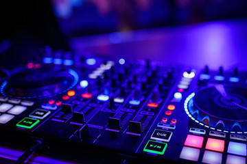 Fototapeta na wymiar closeup view of a DJ's mixing desk