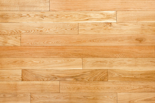 Texture of oak parquet, top view. Light oak planks background