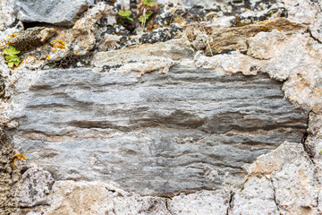 The texture of the old stone. Background. Space for text. Close-up.