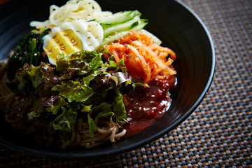 Korean mixed soba noodle with spicy sauce 