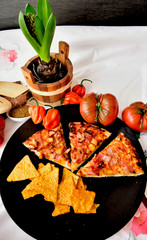  pizza  with vegetables tomatoes and pepper