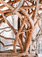 Parts of a wooden hut, bending branches, handmade, winter children's entertainment, fairytale town, wooden craftsman
