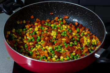 vegetarian stew cooking process in pan food photography background