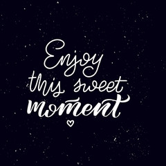 Handwritten calligraphy text, chalk on a blackboard