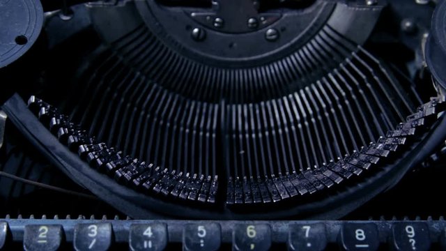 Typing a film script or a book on a vintage typewriter