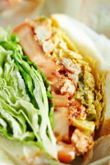 BBQ chicken and tomato sandwich 