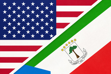 USA vs Equatorial Guinea national flag from textile. Relationship between two american and african countries.