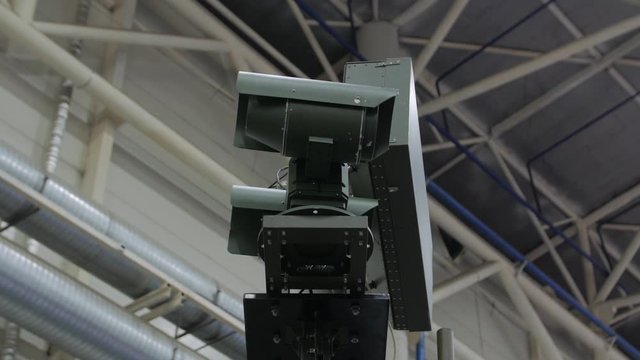 Surveillance military camera radar sight aim sensor detection system guidance system rotates closeup