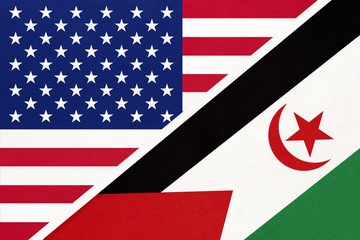 USA vs Sahrawi Republic national flag from textile. Relationship between two american and african countries.