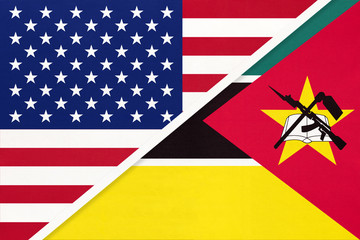 USA vs Mozambique national flag from textile. Relationship between two american and african countries.