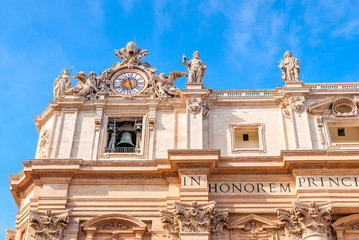 Obraz premium St Peter's Basilica on blue sky background. Vatican,
