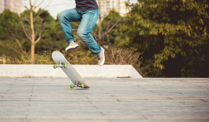 skateboarder jumping outdoors