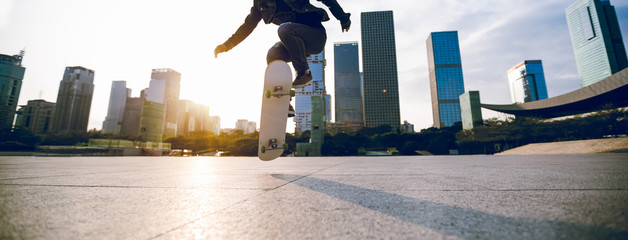 Skateboarder skateboarding at sunset city © lzf