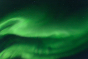 Aurora at night in the sky in the north.