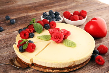 Homemade cheesecake with fresh raspberries and mint for valentines day - healthy organic summer dessert pie cheesecake. Vanilla Cheese Cake for dessert