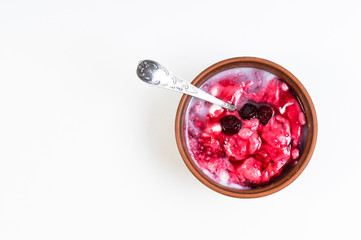 homemade yogurt with jam on a white background, Kopi space