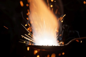 Macro photo of bursting gunpowder