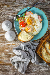 Fried eggs with pork ham.